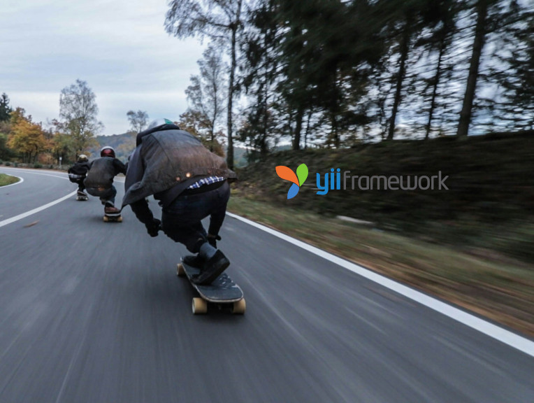 People running on skateboards on a road